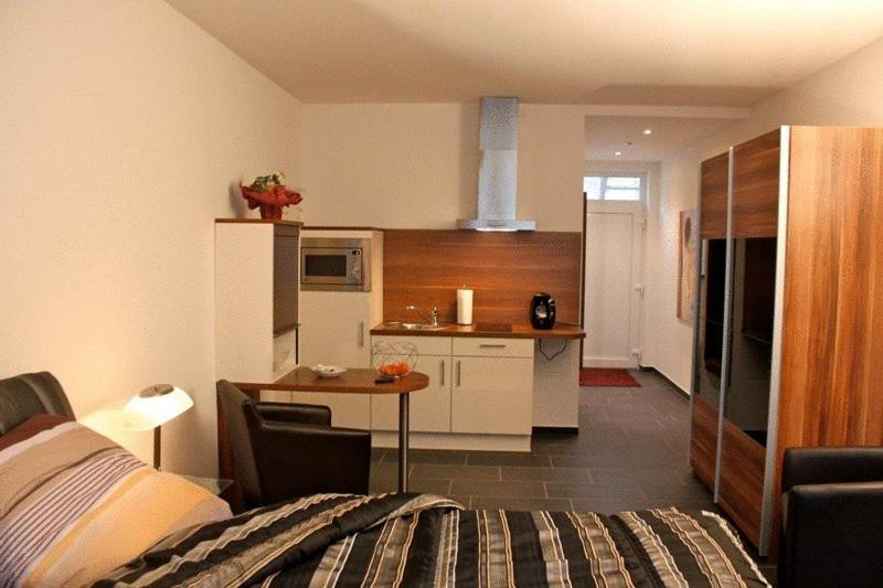Campus Boardinghouse Aparthotel Aquisgrano Quarto foto